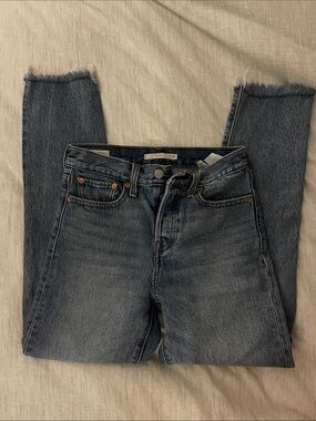 Levi's light medium blue wash Wedgie mid-rise jeans